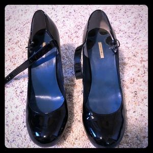 Black patent Mary Jane pumps
